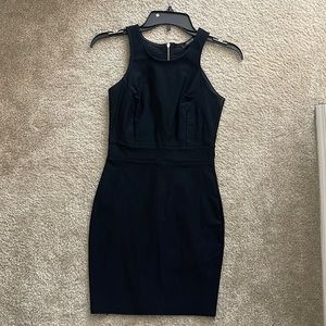 High neck Black mini dress with back cut outs